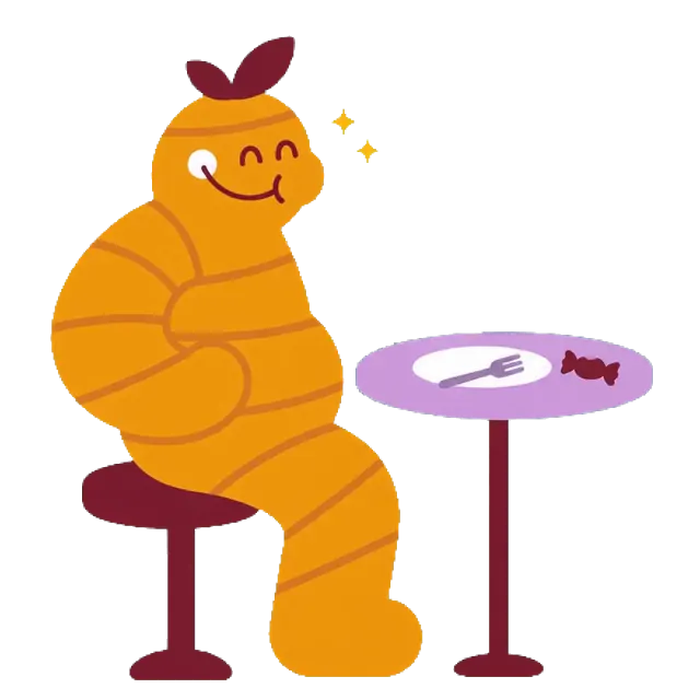 La mascota de Jengizitos, después de almorzar con el estómago revuelto, se come un caramelo de jengibre y queda aliviada